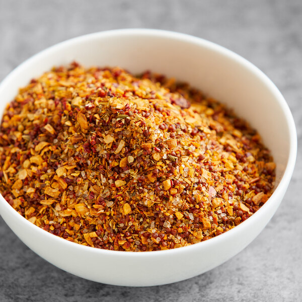 A bowl of Lawry's Santa Fe-Style seasoning on a table.