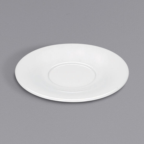 A Bauscher bright white porcelain saucer with a round edge.