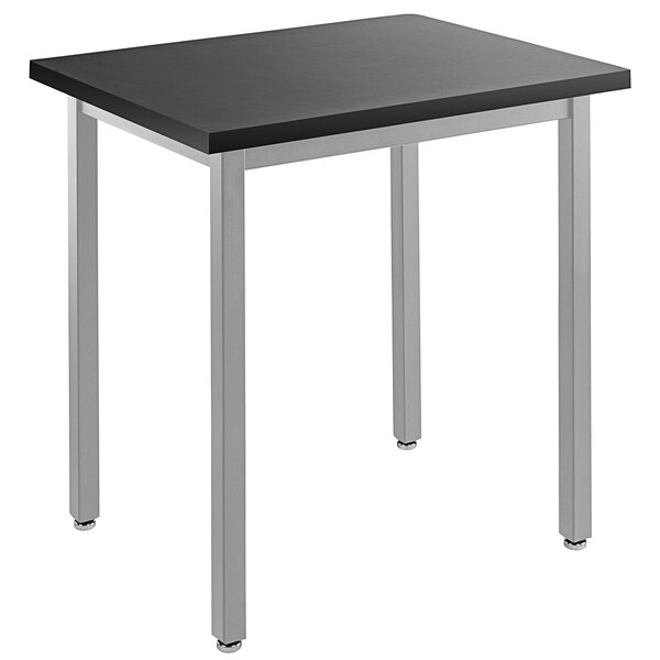 A grey steel National Public Seating science lab table with a steel frame and legs.