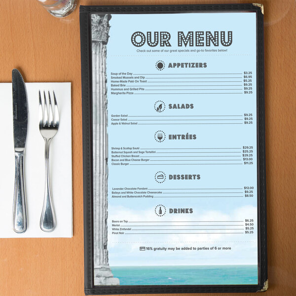 Menu paper with a Mediterranean themed Parthenon design on a table.