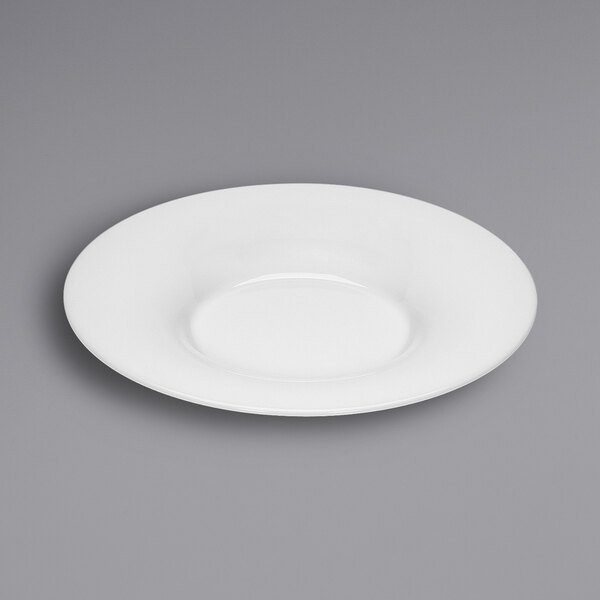 A Bauscher white porcelain deep plate with a wide rim on a gray surface.