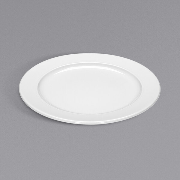 A Bauscher bright white porcelain plate with a wide rim.