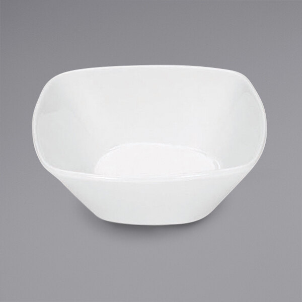 A Bauscher bright white square porcelain saucer with a curved edge.