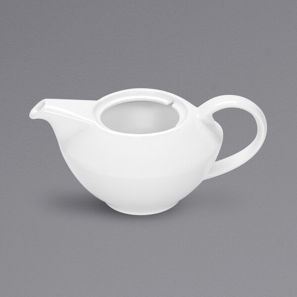 A Bauscher bright white porcelain teapot with a handle.