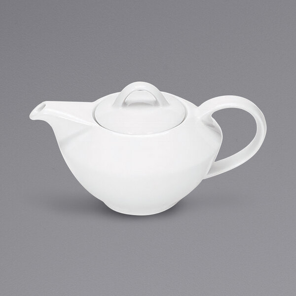 A Bauscher bright white porcelain teapot with a lid.