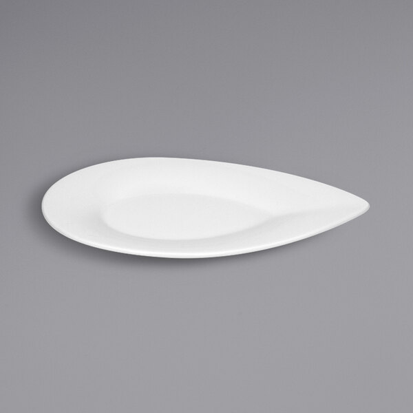 A Bauscher bright white teardrop porcelain platter on a gray surface.