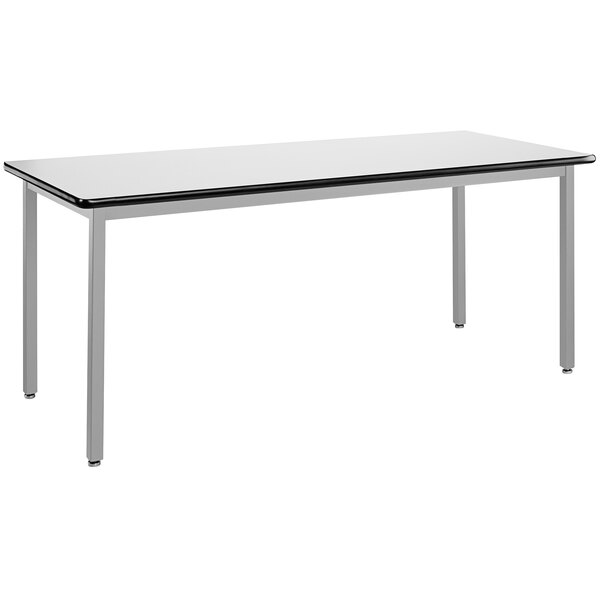 A white National Public Seating utility table with a whiteboard top and black legs.