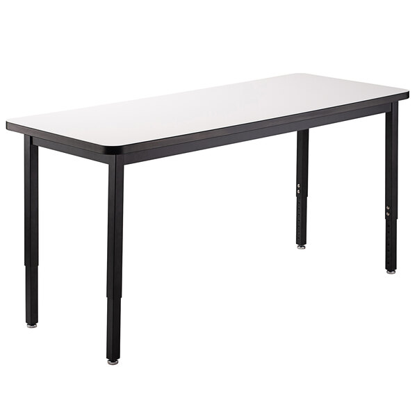 A National Public Seating utility table with a white rectangular whiteboard top and black legs.
