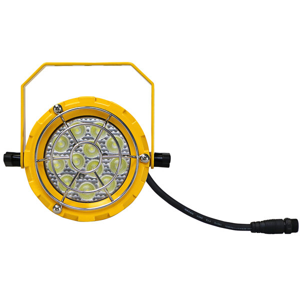 A TPI Fostoria yellow LED loading dock light with a black and white wire.