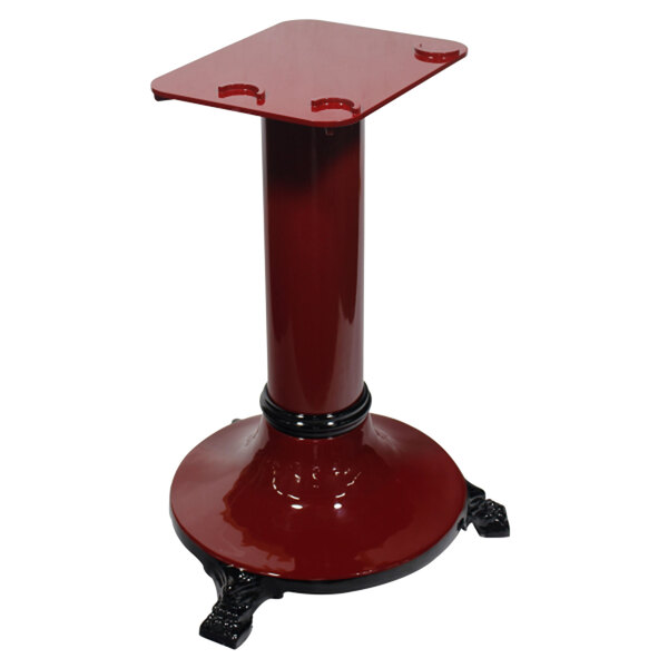 A red pedestal with black legs for an Omas manual slicer.