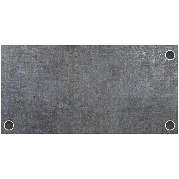 A rectangular grey surface with holes in it.