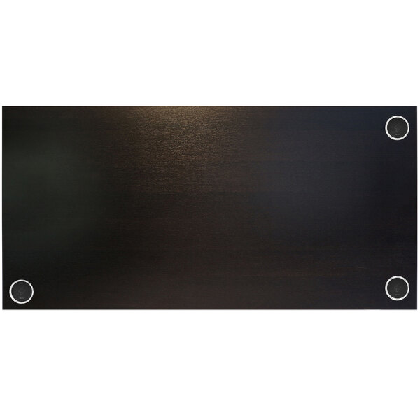 A black rectangular BFM Seating tabletop with round holes in it.