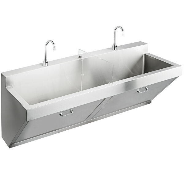 An Elkay stainless steel wall hung double bowl surgeon scrub sink with two faucets.