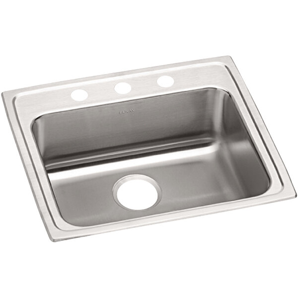 A stainless steel Elkay sink with three faucet holes.