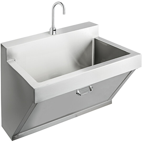 An Elkay stainless steel surgeon scrub sink with a faucet and drain.