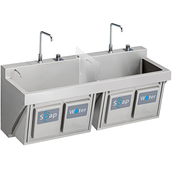 An Elkay stainless steel wall hung surgeon scrub sink kit with two faucets over two sinks.