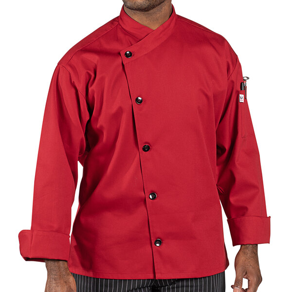 A man wearing a red Uncommon Chef long sleeve chef coat.