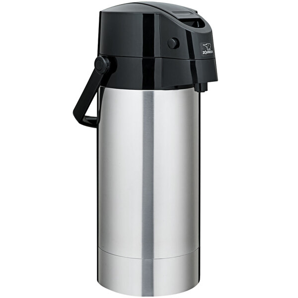 A Zojirushi stainless steel air pot with a black lever and handle.