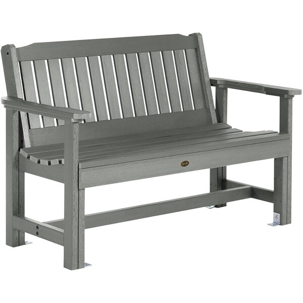 A grey bench with a coastal teak faux wood seat.