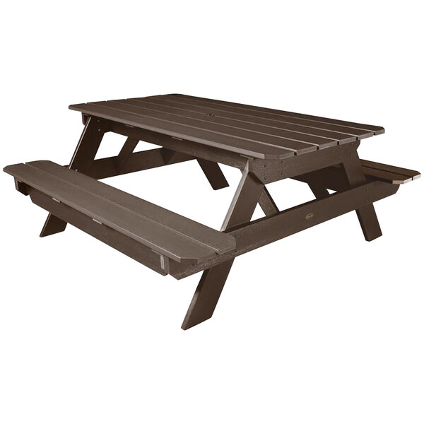 A brown Sequoia faux wood picnic table with benches.