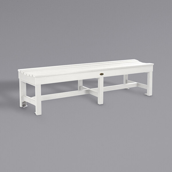A white bench with legs.