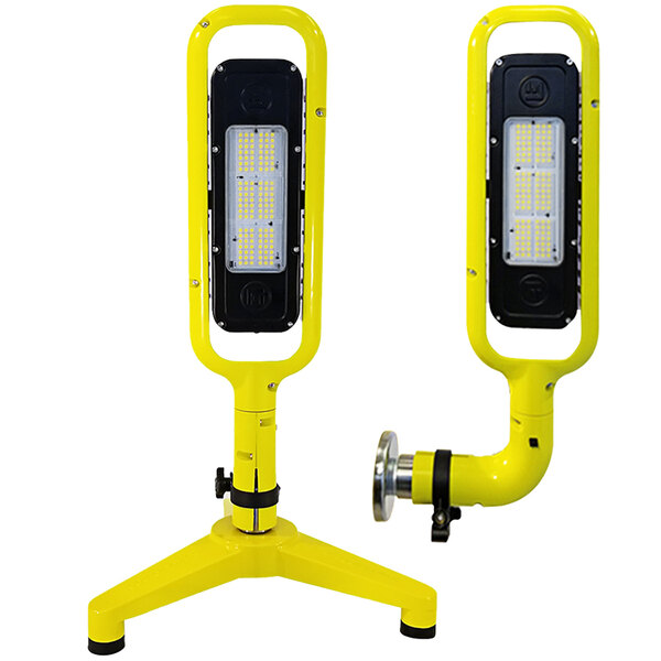 A Lind Equipment Beacon Infinity LED portable area light with floor stand and magnetic mount shining yellow light.