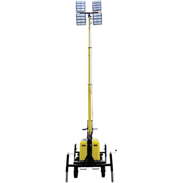 A yellow light tower with four lights on it.