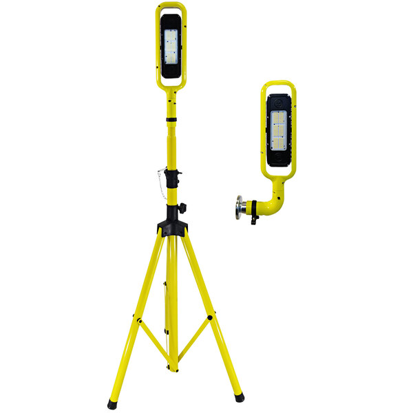 A Lind Equipment Beacon Infinity LED portable area light on a yellow tripod.