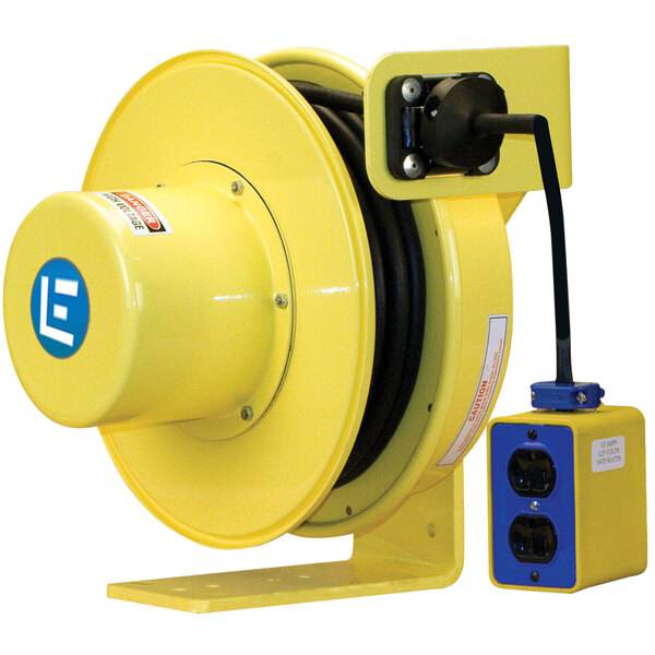 A yellow electrical reel with a black power cord.