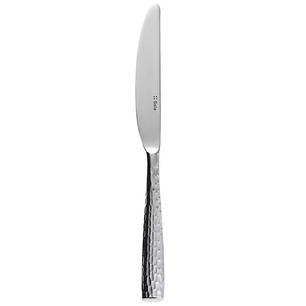A Sola stainless steel dessert knife with a textured silver handle and silver blade.