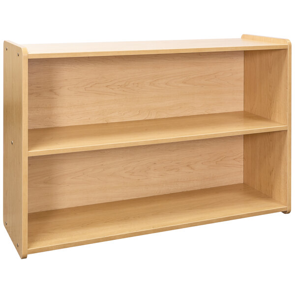 A wooden Tot Mate preschool storage shelf with shelves.
