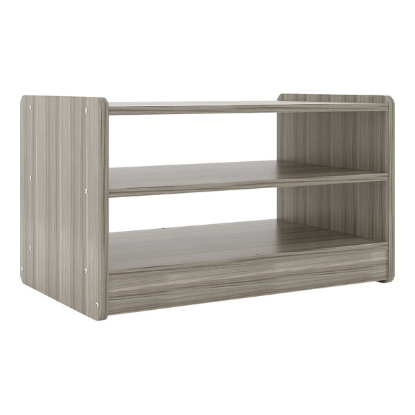 A wooden shelf with shadow elm laminate and metal legs.
