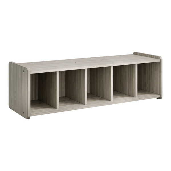 A white wooden shelf with six compartments.