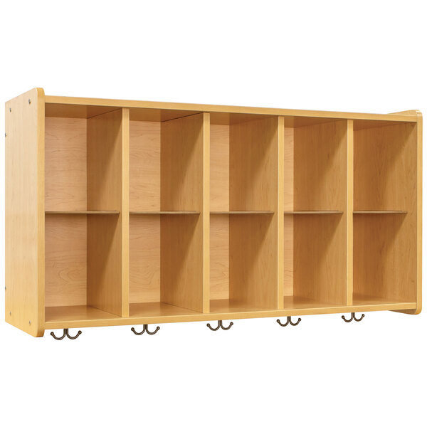 A maple wooden wall cubbie storage shelf with hooks.