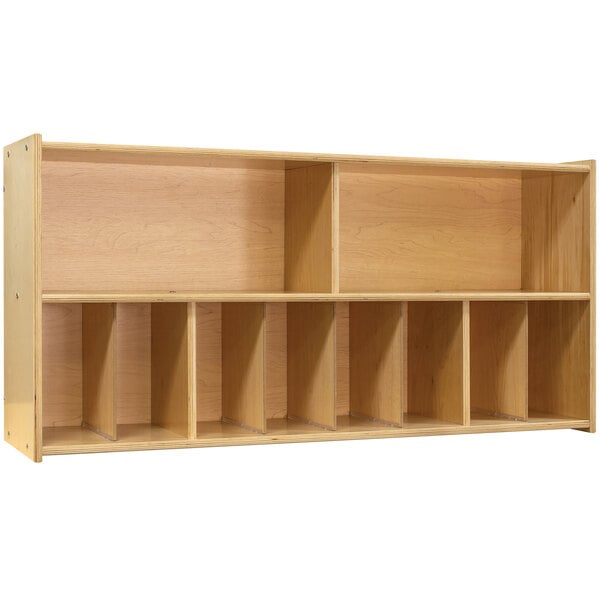 A natural birch plywood diaper wall storage with multiple compartments and shelves.
