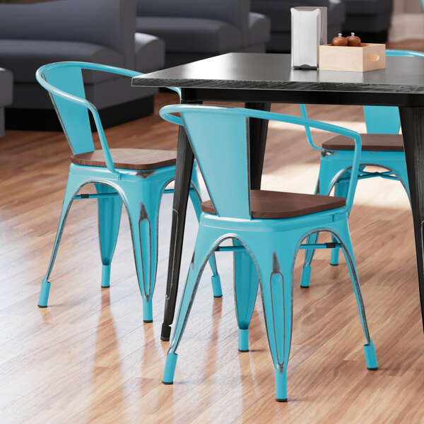 Lancaster Table & Seating Alloy Series Distressed Arctic Blue Metal Indoor Industrial Cafe Arm Chair with Vertical Slat Back and Walnut Wood Seat
