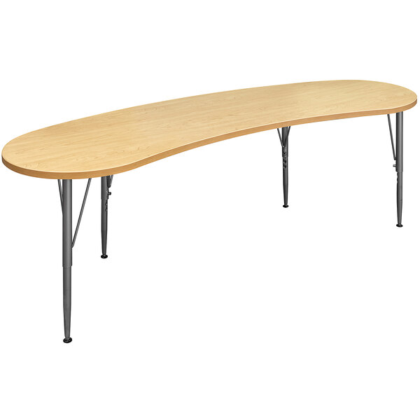 A Tot Mate maple laminate table with curved edges and adjustable legs.