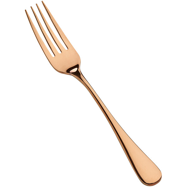 A close up of a Bon Chef rose gold dinner fork.