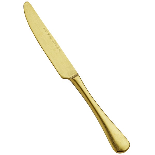 A Bon Chef stainless steel dinner knife with a matte gold handle.