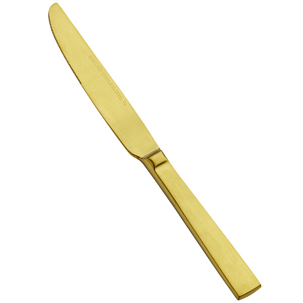 A Bon Chef stainless steel knife with a matte gold handle.