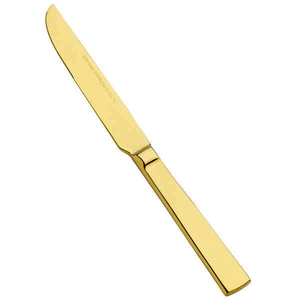 A Bon Chef stainless steel dinner knife with a gold handle.