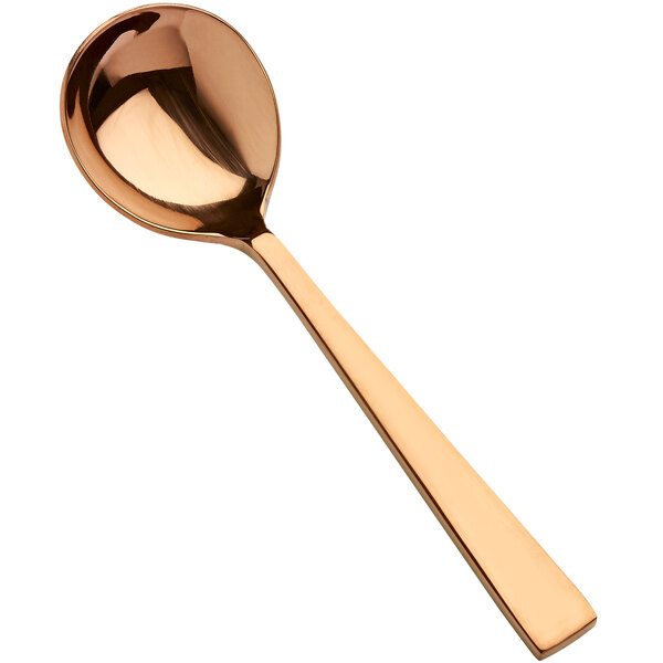 A Bon Chef rose gold round bowl soup spoon with a handle.