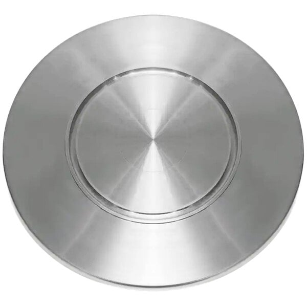 A silver circular plate with a circular design in the center.