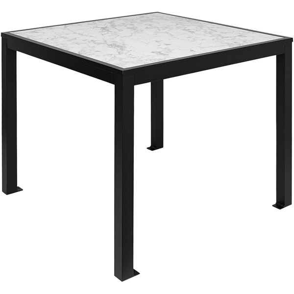 A BFM Seating Surf table with a white and black marble top and metal legs.