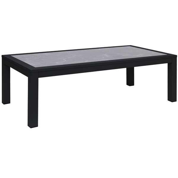 A black rectangular BFM Seating coffee table with a white marble top.