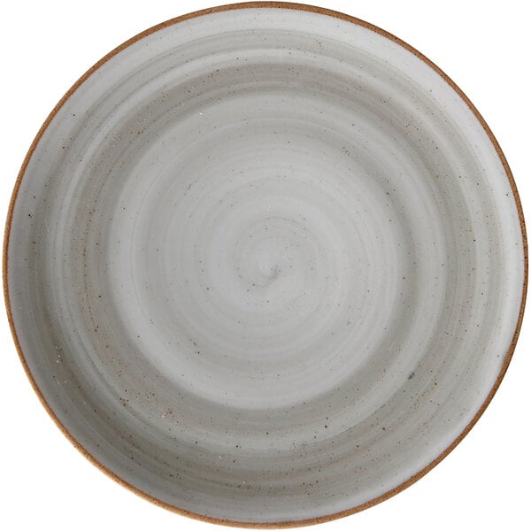 A white porcelain plate with a brown rim.
