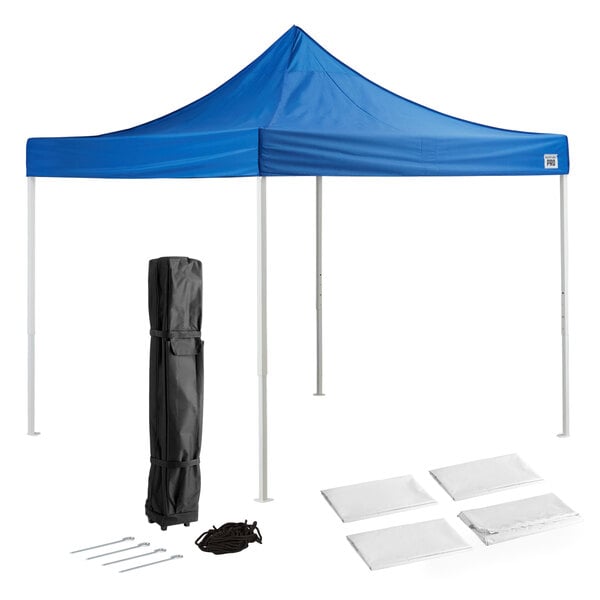 A blue tent with a black bag and poles.