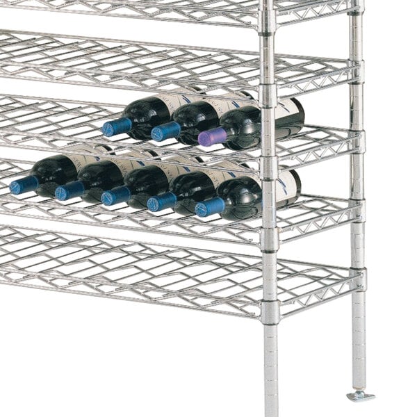 A Metro wine cradle rack with wine bottles on it.