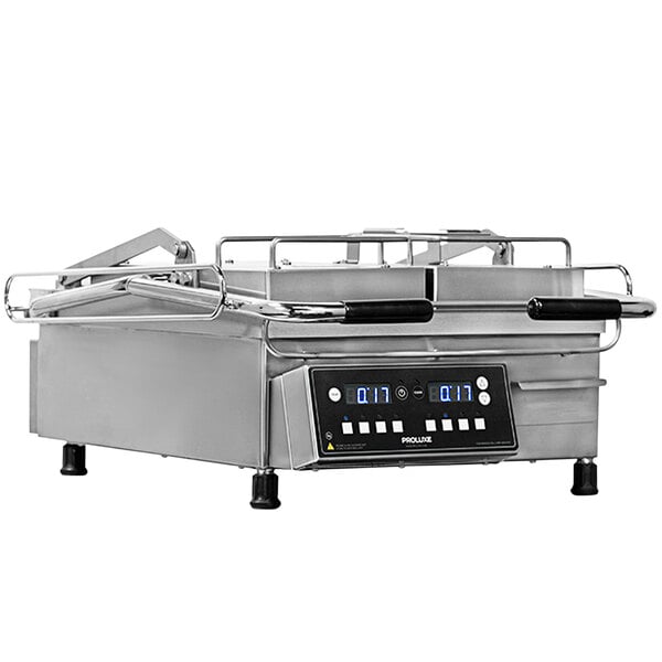 A Proluxe Vantage split lid grill with smooth plates on a counter in a professional kitchen.