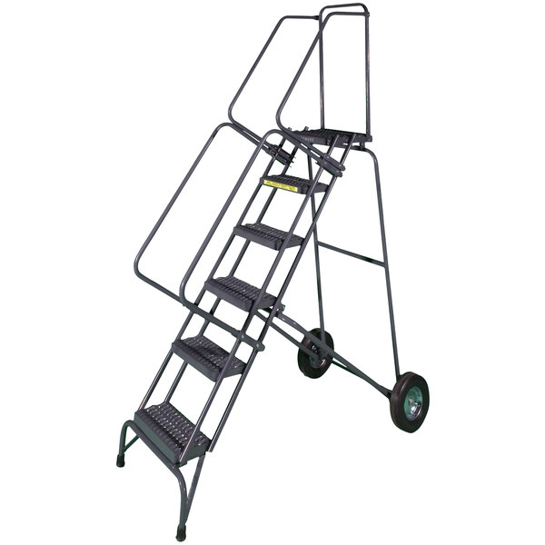 A gray steel folding rolling ladder with wheels.